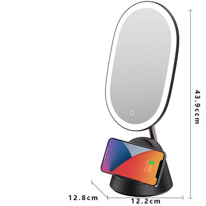 White adjustable LED desk lamp with integrated circular makeup mirror on a desk.