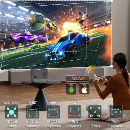 Black HD smart portable projector with remote control and cables on a table