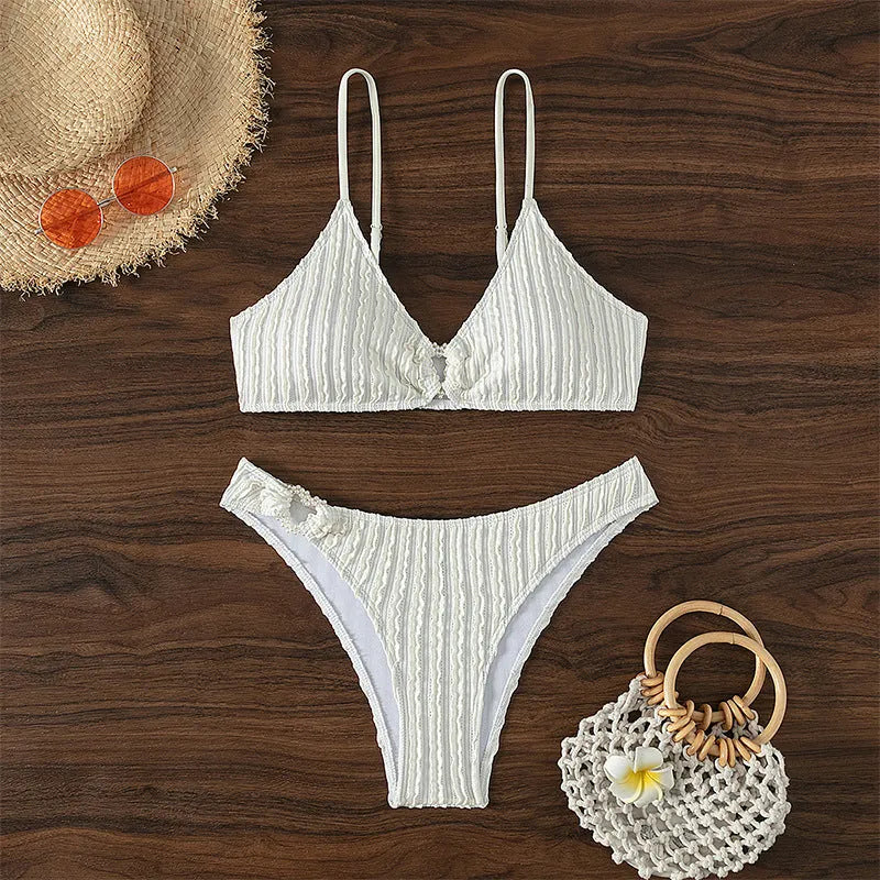 White women's V-neck beach split swimsuit with sleeveless design