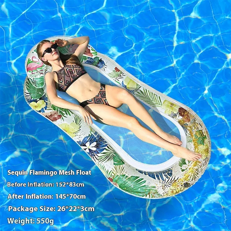 A person lounging on a large, colourful inflatable floating row with sequin details in a swimming pool.