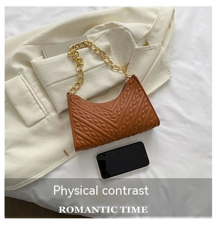 Brown pleated chain baguette shoulder underarm bag with adjustable strap and soft carry handle