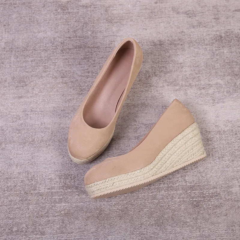 Women's wedge heel pumps with rope bottom detail in apricot colour with shallow mouth design