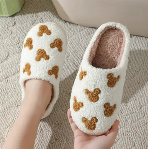 Cotton indoor slippers with suede upper, TPR sole, and thickened design, available in various colours and sizes.