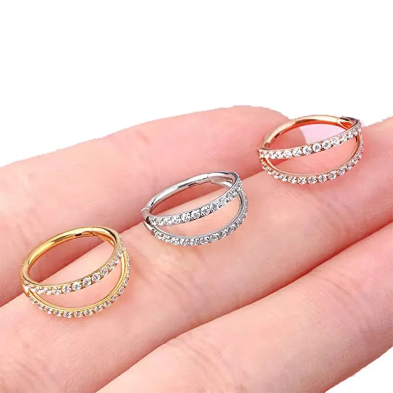G23 titanium alloy nose ring with diamond-treated surface in gold or steel colour, showing precise gauge measurements
