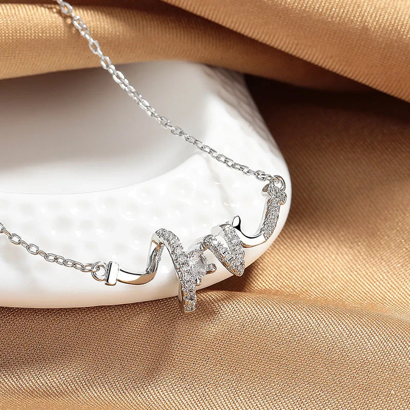 Elegant LOVE Necklace for Women in silver and gold, featuring a delicate O-shaped chain and LOVE pendant.