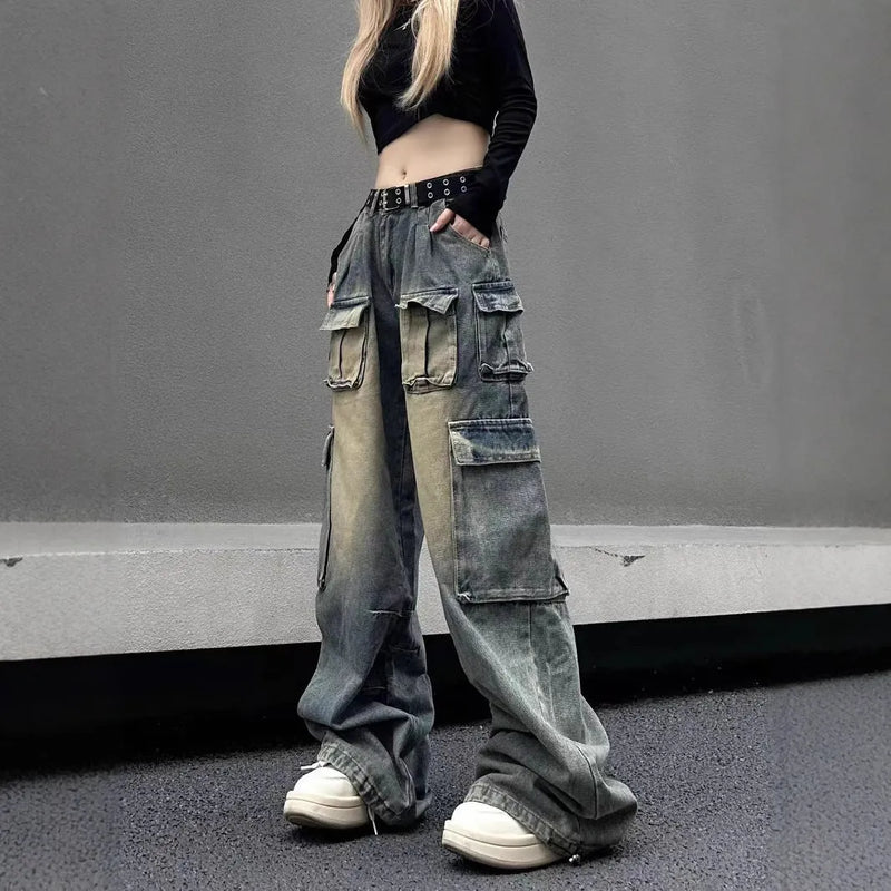 Multi-pocket loose distressed denim pants with non-ironing treatment in straight-leg tooling style, available in light blue or black cotton denim for street hipster casual wear, sizes S M L XL 2XL.