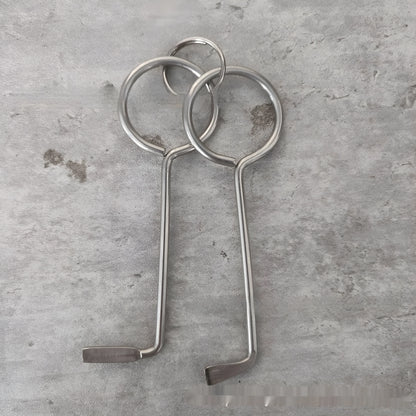 Two silver alloy wrench tools from a portable universal family set on a plain background.