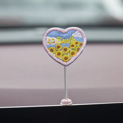 Set of six small yellow PVC ducklings and a white Hello sign for car dashboard decoration.