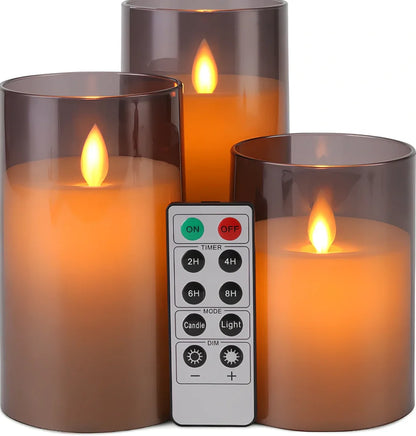 LED electronic remote control candle with swinging flame in smoky gray, transparent white, and amber gold styles