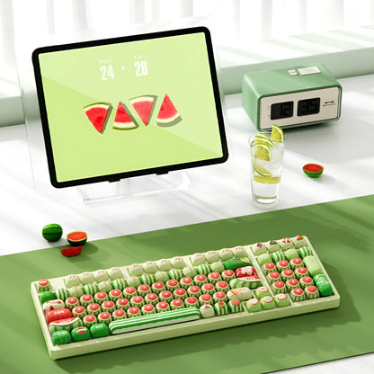 Set of 138 watermelon-themed PBT key caps with green, red, and black dye-sublimated design, shown on a mechanical keyboard.