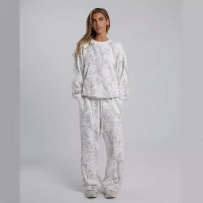 Camouflage and maple leaf print two-piece set for women featuring a hoodie and sweatpants in a variety of sizes
