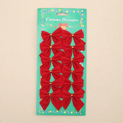 Polyester Christmas tree bow ornament in red, gold, and silver colours measuring 5 cm wide