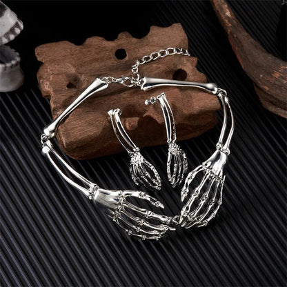 Dark style skull and ghost hand necklace and earrings set with electroplated alloy construction