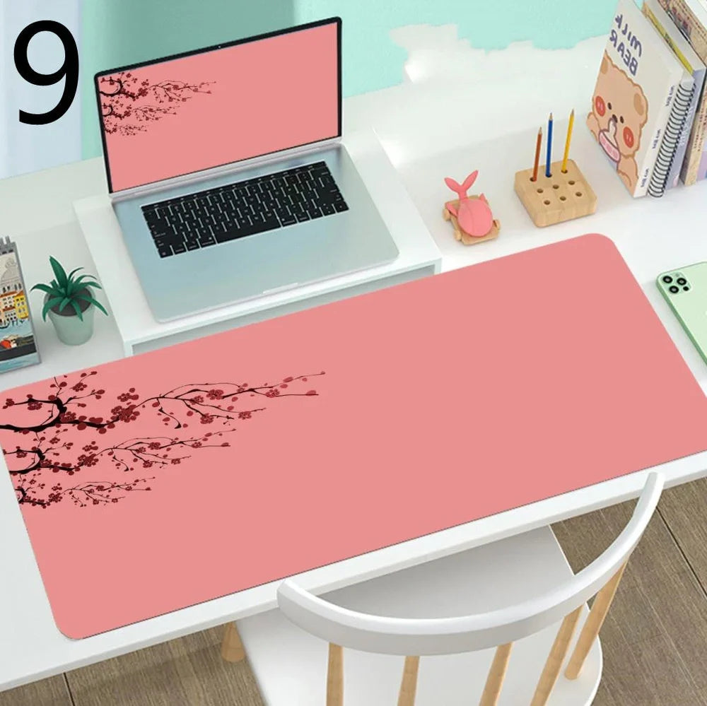 Large gaming mouse desk mat showing printed design on rubber surface with size options up to 400x900mm