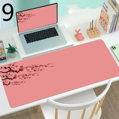 Large gaming mouse desk mat showing printed design on rubber surface with size options up to 400x900mm