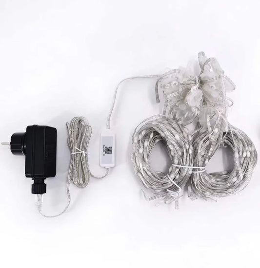 Programmable LED curtain light with Bluetooth app control showing 400 individual lights in curtain formation