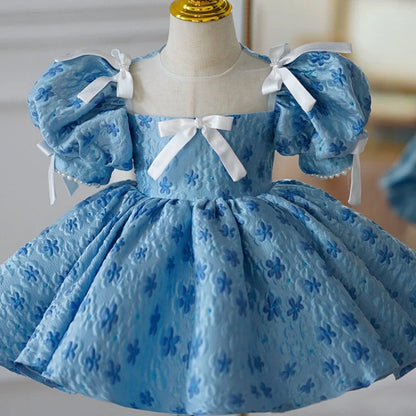 Blue polyester girls' princess dress with pettiskirt layering, shown in princess style for birthday occasions
