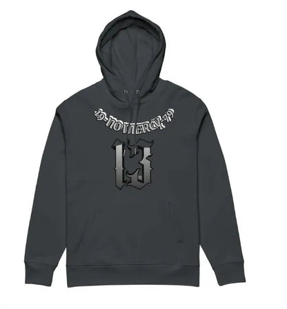 Man wearing a loose fit, fleece-lined hooded sweater pullover in grey.