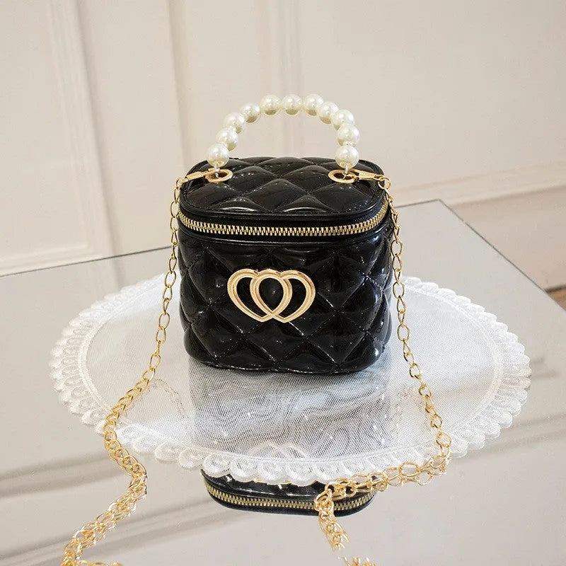 PVC bucket-style gel bag with a heart-shaped pattern, shown in apricot colour.