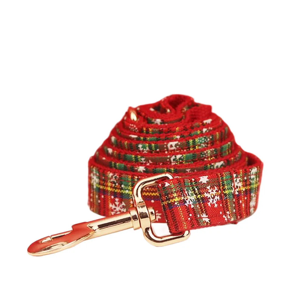 Red snowflake plaid Christmas dog collar and leash set with matching floral vest and bow accessory