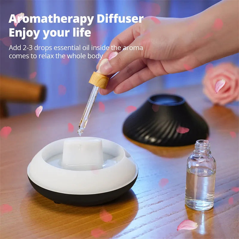Beige volcanic flame aroma diffuser with LED lighting and mist output on wooden surface