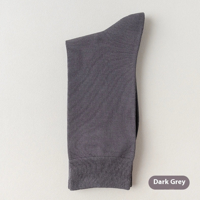Mid-calf business socks in solid colours with combed cotton construction and deodorant function