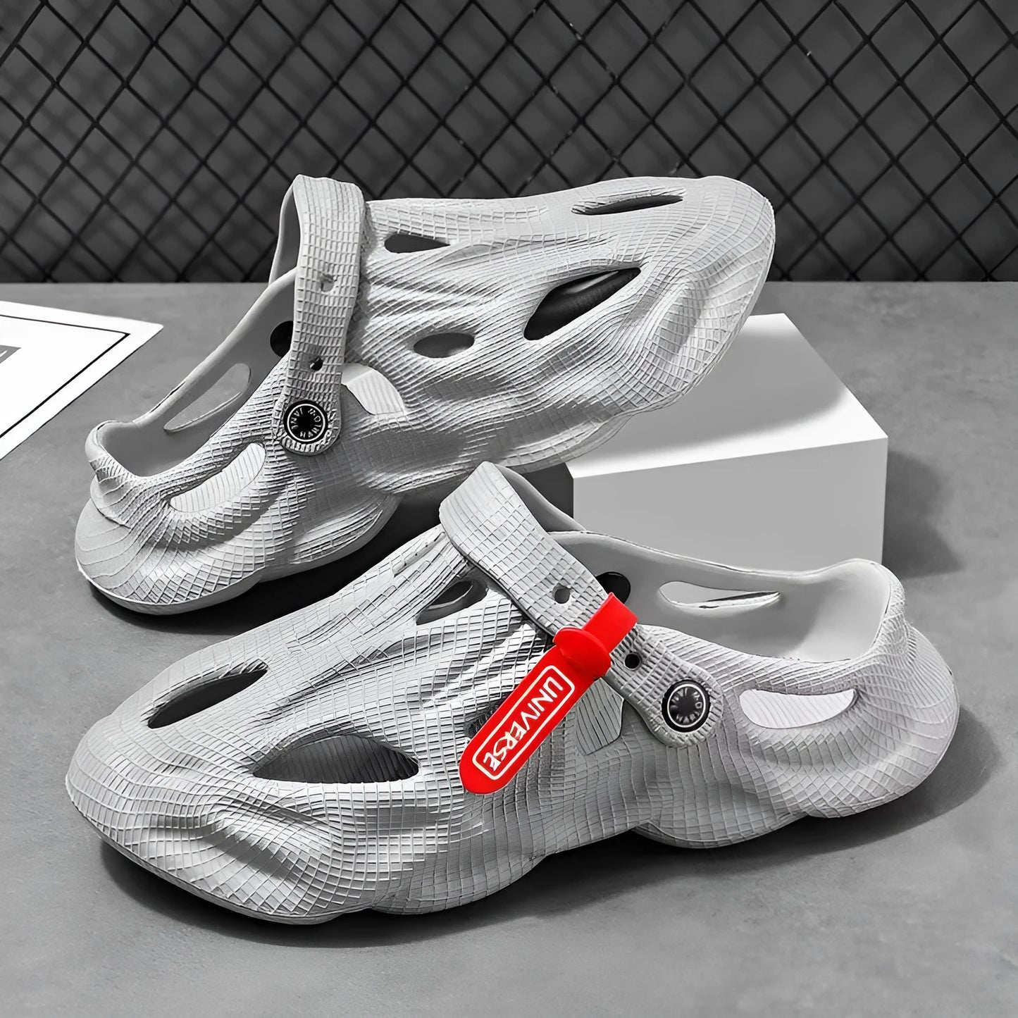 Coconut slippers with closed toe design in EVA material available in grey, black, white, and khaki colours