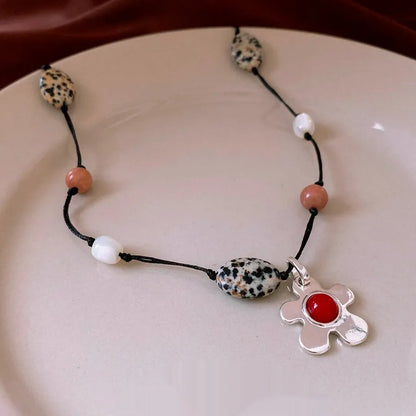 Stone shell beaded flower pendant necklace with adjustable chain in silver-gold colour