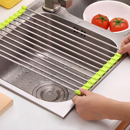 Black folding stainless steel sink drain rack with silicone edges, shown both unfolded for drying and folded for storage
