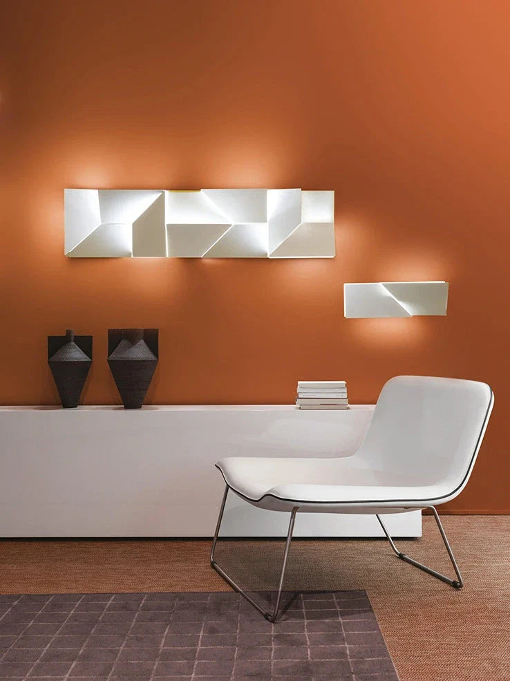 Minimalist iron wall lamp in matte white with LED lighting and slim profile