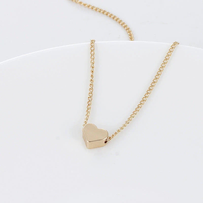 Elegant clavicle necklace with a double-sided love pendant, made of high-quality alloy for a timeless, fashion-forward look.