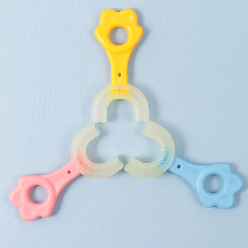 U-shaped baby toothbrush in soft silicone for kids, available in multiple colors
