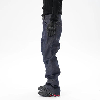 Man wearing dark blue loose-fit straight-leg denim jeans, showcasing the casual relaxed silhouette.
