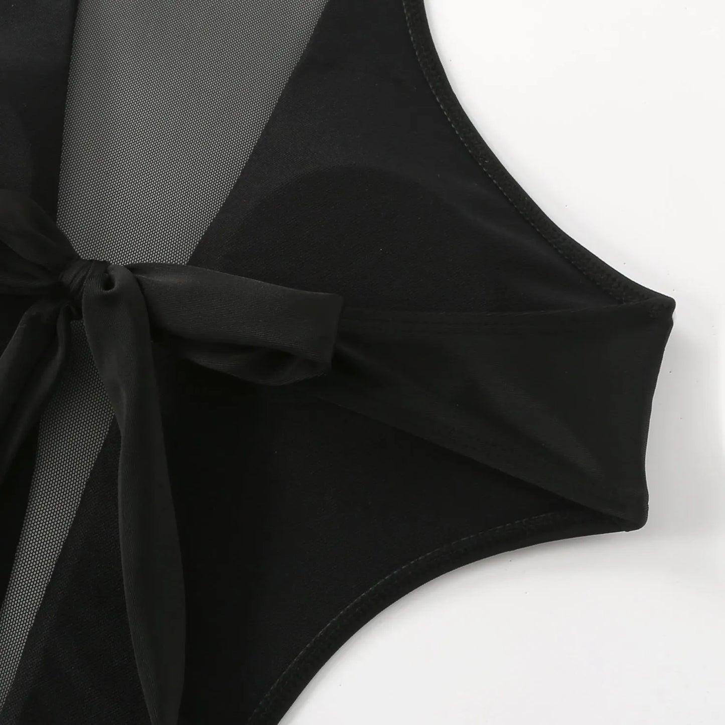 Black women's one-piece swimsuit showing nude back and hollow-out strap design.