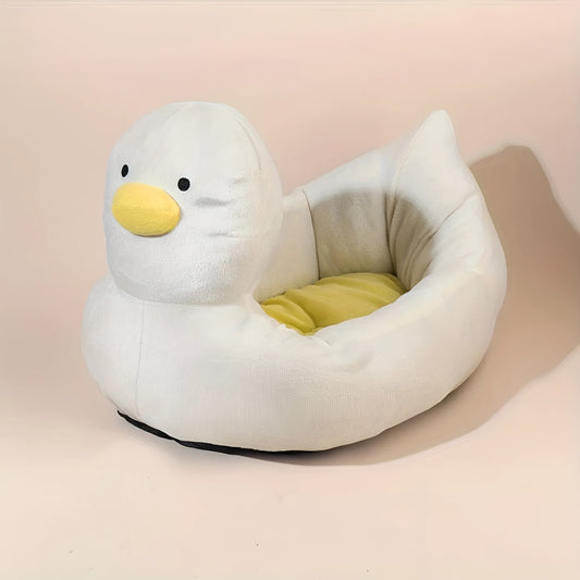 Blue duck shape fluffy pet bed sofa for small dogs and cats on a wooden floor
