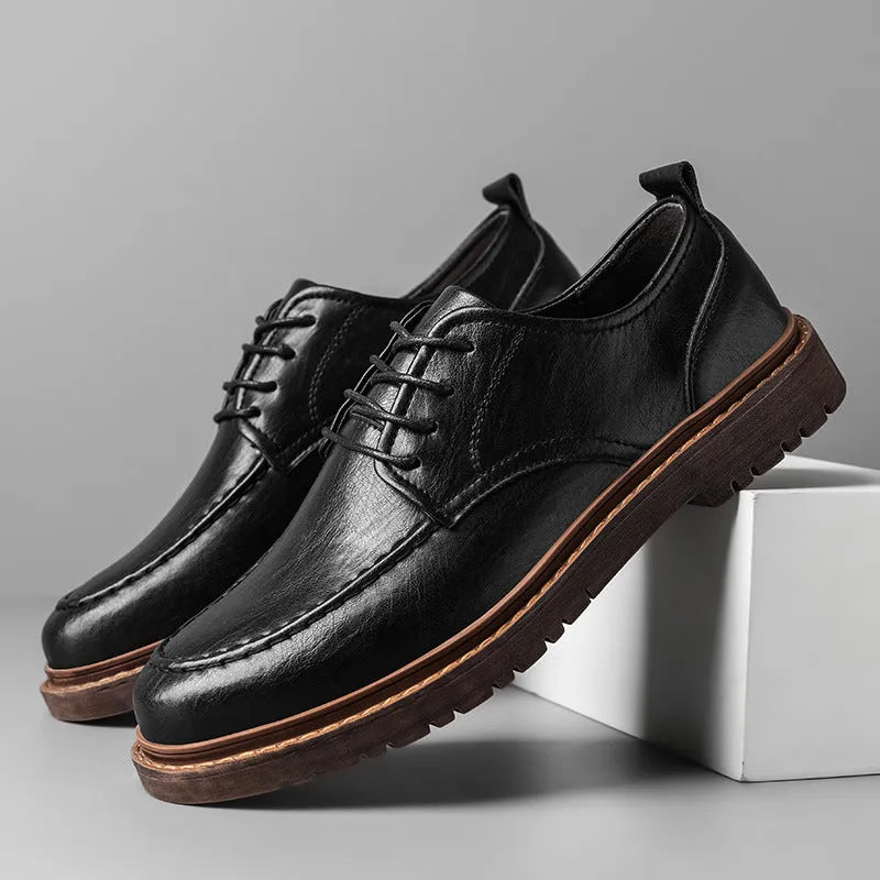 Brown casual leather shoes with round toe, flat heel, and visible sewing lines on the cowhide upper.