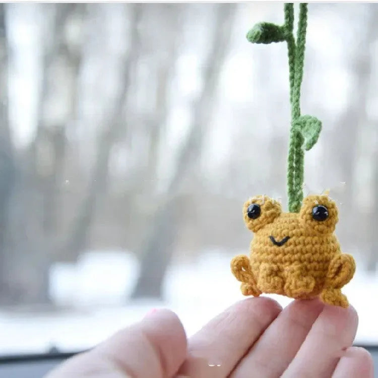Handmade woven frog car pendant in plush material measuring 5cm wide