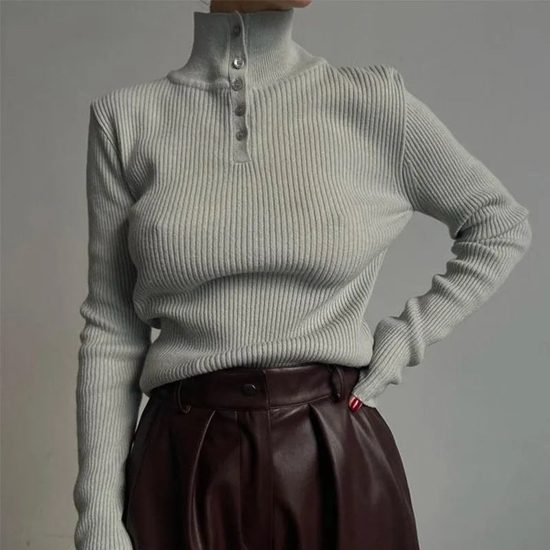 Slim fit half turtleneck pullover sweater made from cotton and spandex core-spun yarn featuring a single-breasted placket design available in silver grey or rice apricot colours in S, M, L sizes suitable for commuting wear