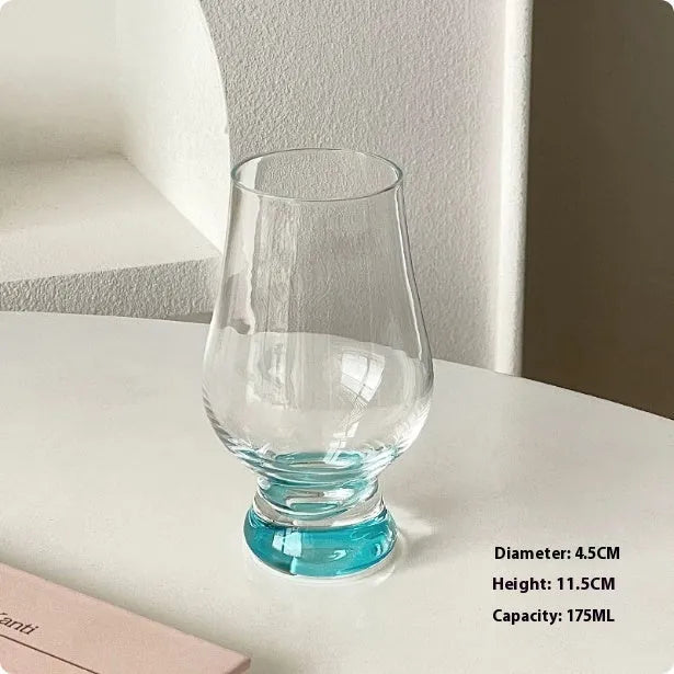 Medieval French design red wine glass with bamboo-inspired stem and wide bowl for wine aeration