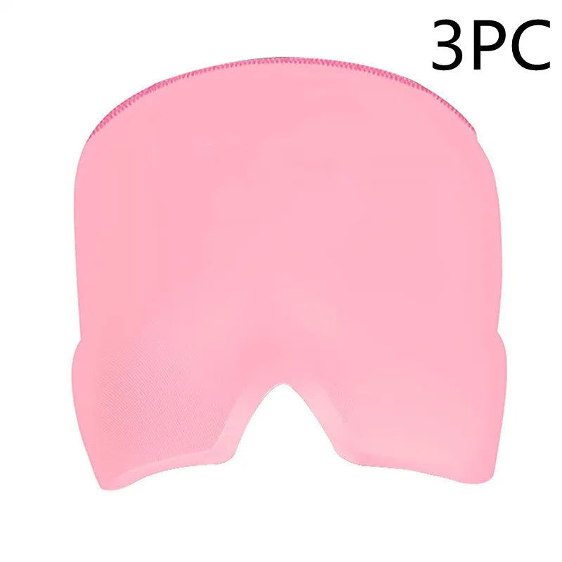 Black elastic cooling gel eye mask for headache relief placed on a forehead.