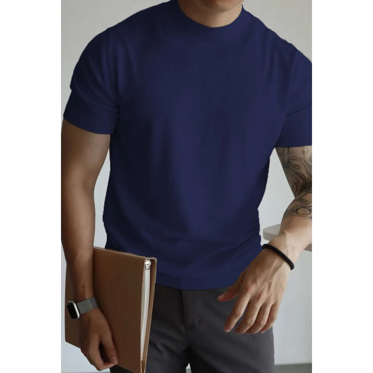Men's slim-fit solid colour t-shirt in breathable polyester knitwear, shown in multiple colour options.