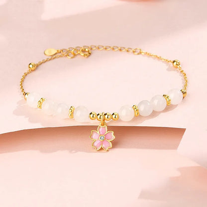 Pink silver bracelet with cherry blossom pendant and Hetian jade beads
