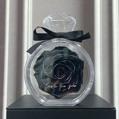 Preserved floral ornaments in various colors, displayed in a transparent cover for elegant home decor