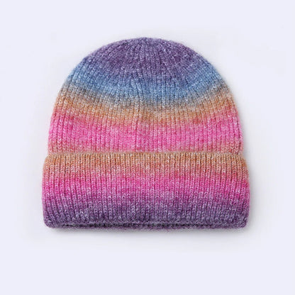 Gradient yarn knitted hat with tapered top in light blue colour showing knitted texture