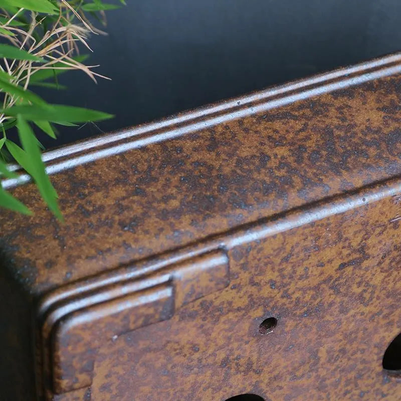 Purple sand rectangular bonsai pot with five-line design and firewood burning texture, shown with pine bonsai
