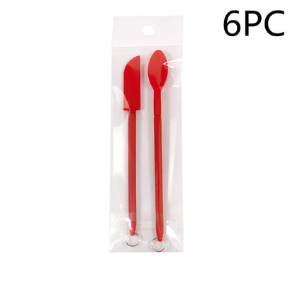 Retractable silicone cosmetic spatula extended to 15cm with scraper tool for product application