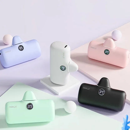 Compact lipstick-style power bank showing screen display with battery percentage, measuring 78mm x 51mm x 25mm
