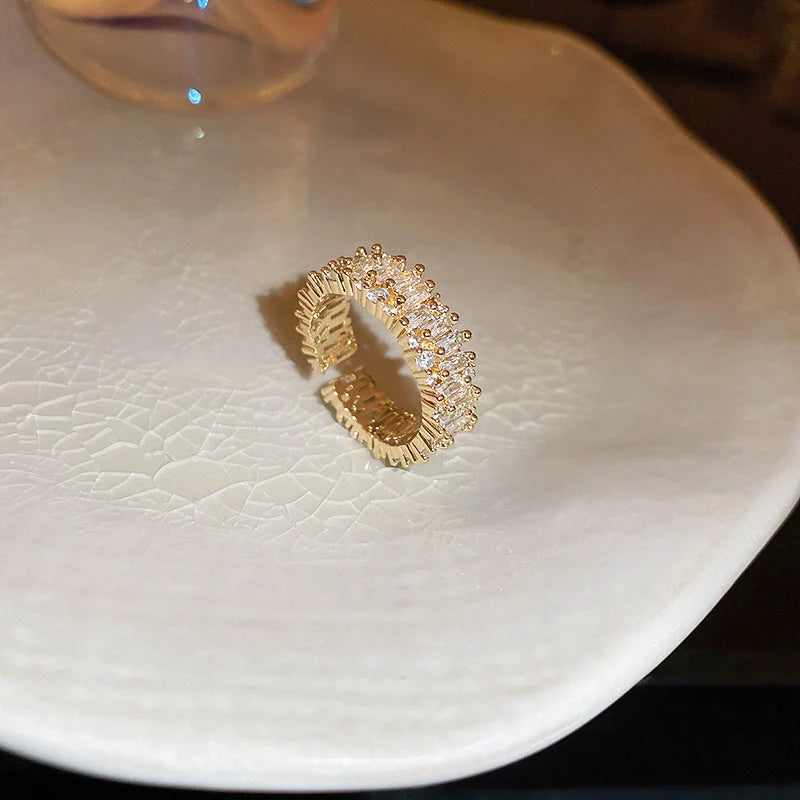 Elegant pearl hollowed-out square open-end zircon ring for women, fashion jewelry with geometric design.