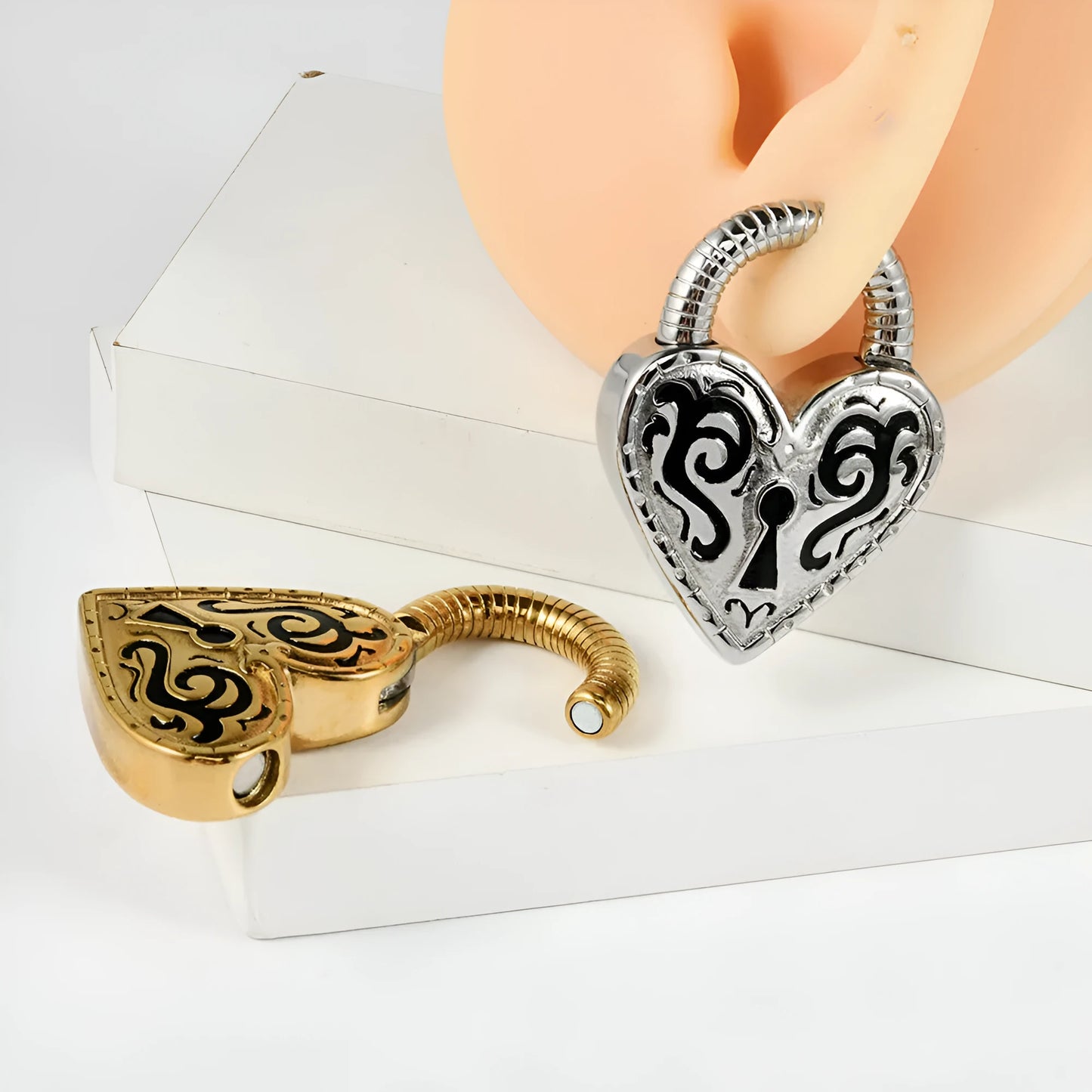 Women's heart-shaped fashion earrings in stainless steel with gold or steel colour electroplating