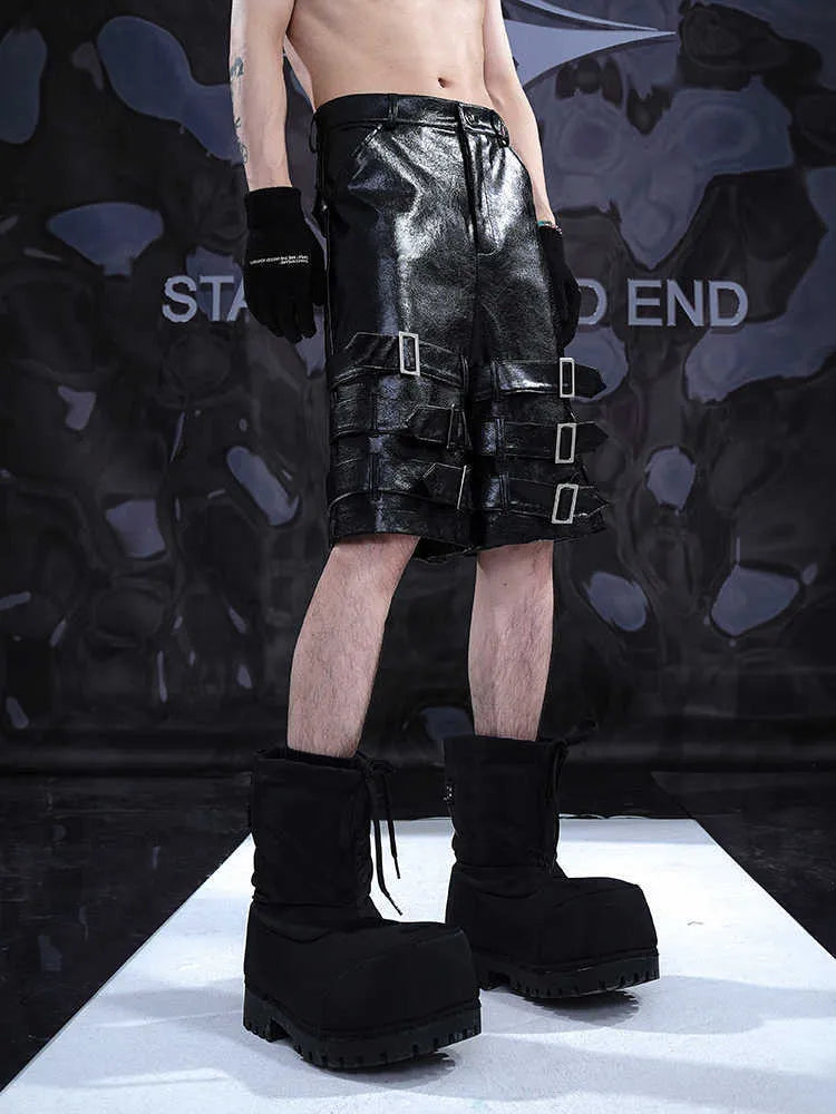 Men's black PU leather cropped pants with medium low waist, made from 100% polycarbaminate fibre, showing front view